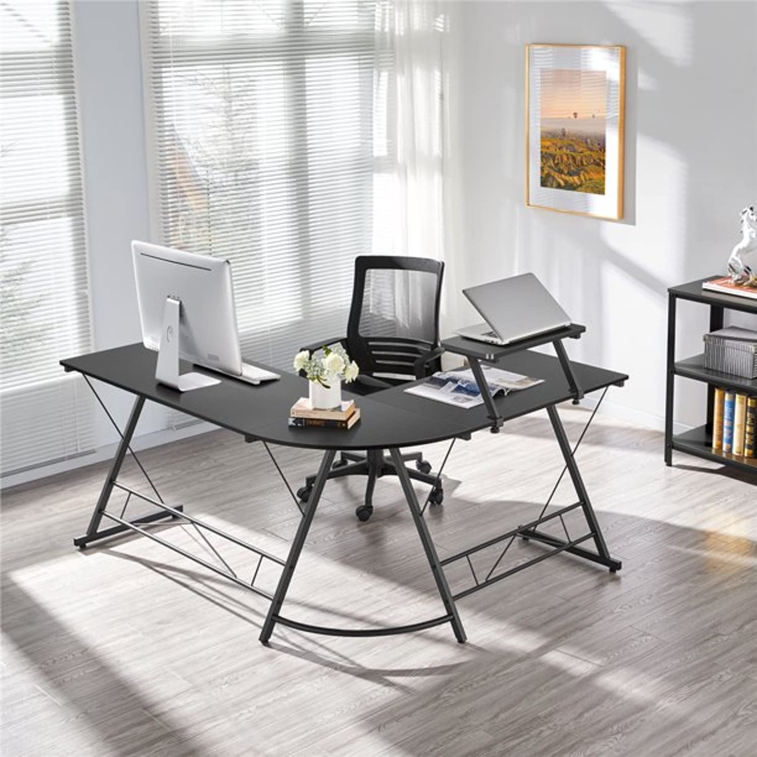 Stylish modern office furniture UAE featuring a sleek black desk and ergonomic chair in a bright workspace